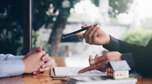 Real estate agent meets with a buyer to discuss the homebuying process