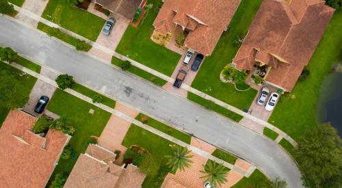 Aerial view of a residential street in a suburban neighborhood