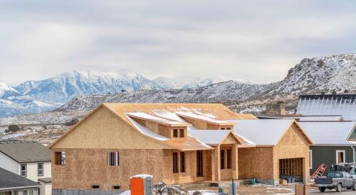 A single-family home under construction in Utah mountains