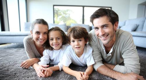 Family enjoying healthy indoor air quality in a net zero home