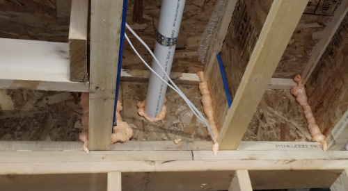 Air sealing floor system over the garage