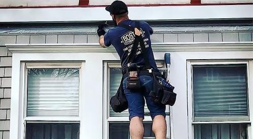 In an Instagram post, a crew member from Boston Exterior Remodeling completes a home exterior with Foundry’s Grayne Shingle Siding.