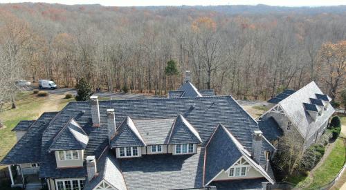 Westlake Royal Building Products' - DaVinci Roofscapes Select Shake in the Black Oak color pattern.