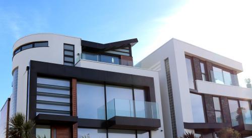 Modern home exterior on sunny day