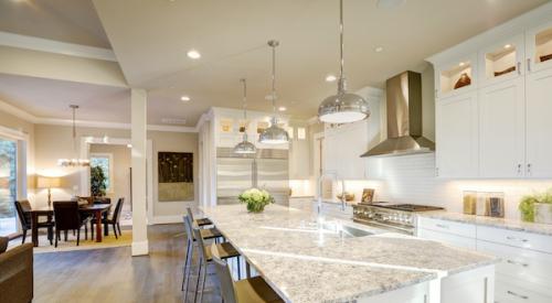 Interior of open-plan home with large kitchen island