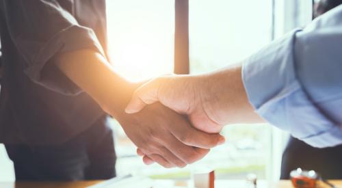 Two people shaking hands