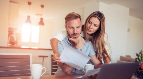 Couple looking at bills