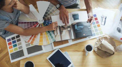 Couple reviews catalogs to prepare for home renovation