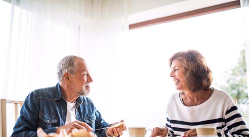 Older couple eating a meal