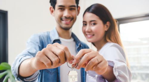 Smiling new homeowners