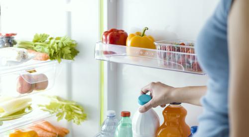 Person opening fridge