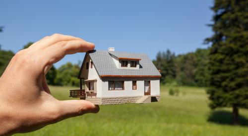 House imagined on open land