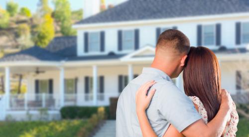 Couple looking at house