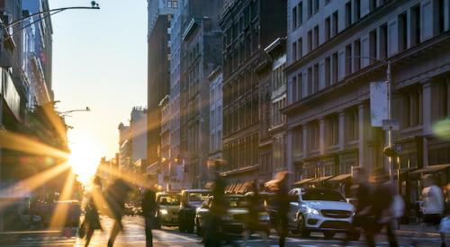 People walking across New York City street