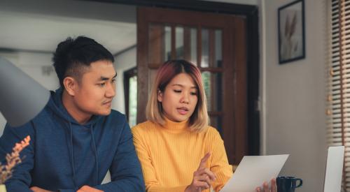 Couple reviewing paperwork