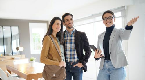 Two buyers viewing a home