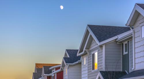 Townhomes with moon in the sky