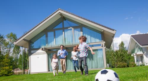 family playing soccer