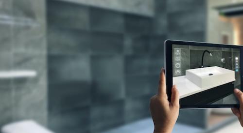 Person holding a tablet up to empty wall and seeing a virtual sink appear