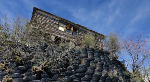 Home built on foundation of tires