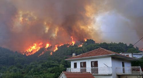 House near wildfire