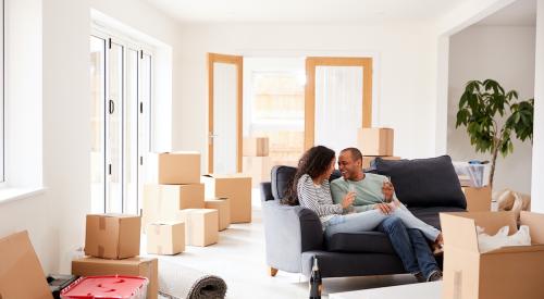 Smiling couple in new home