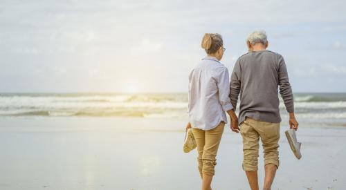 Couple walking on the beach