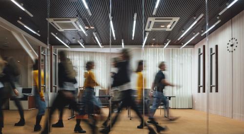 Employees walking in office