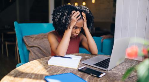 Woman worried on laptop