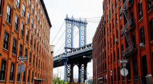 Manhattan Bridge between two New York City apartment buildings