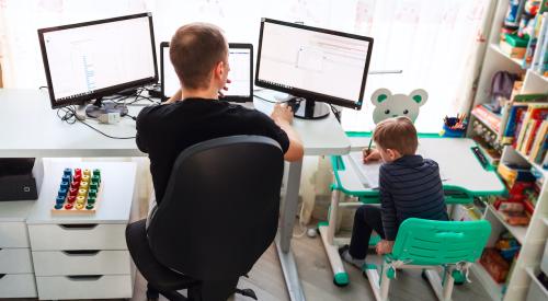 Father and son working from home