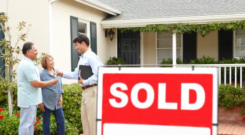 Couple purchasing a home from realtor