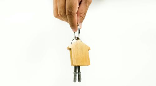 Man holding house keys