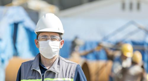 Construction worker wearing mask