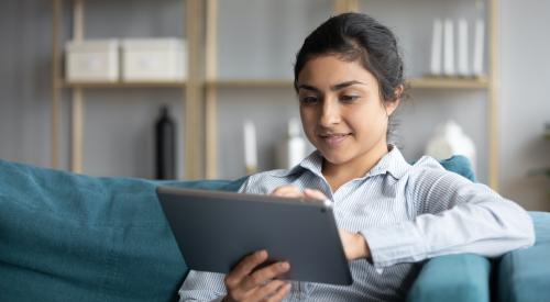 Woman looking at tablet