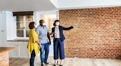 Couple touring home with broker