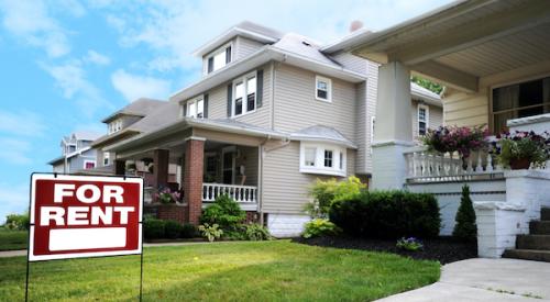 Single-family home with for rent sign in front yard