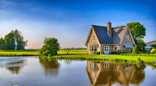 House next to a pond