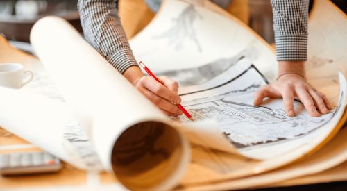 Architect marking up build-to-rent site plans