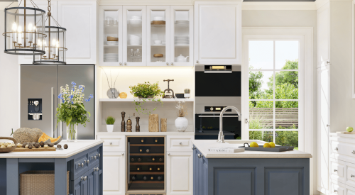 Blue and white kitchen with large windows for lots of natural light