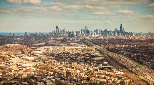 Chicago city skyline and suburban sprawl seen from above