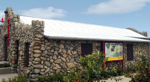 The historic barn and pumphouse on the Citrus Glen site, renovated.