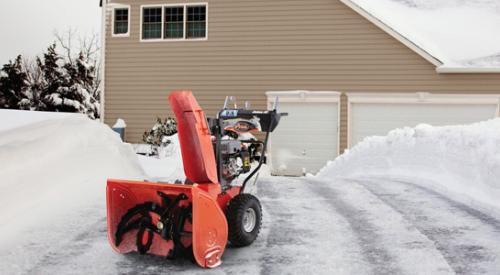 Snow blower in winter weather