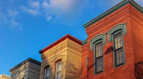 Upper floors of colorful DC townhomes in a city that in increasingly unaffordable