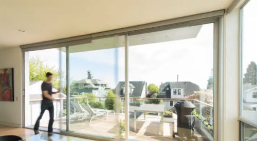 La Cantina's multi-slide aluminum doors help connect the indoors to outside