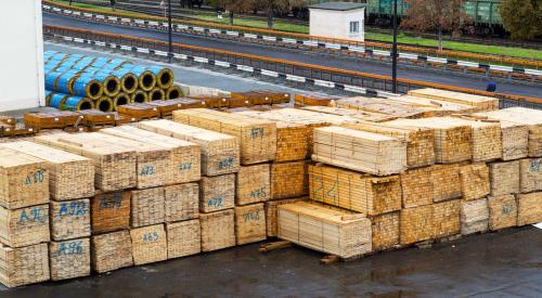 Pallets of lumber in lumber yard