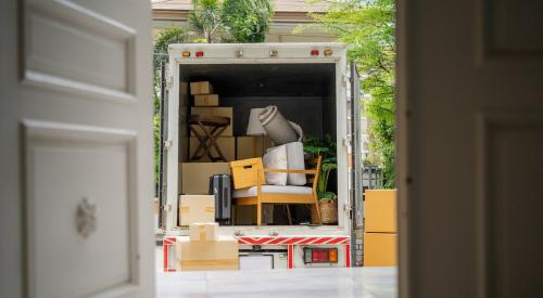 Moving truck seen from open front door