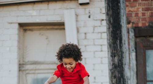 Man_raising_child_above_his-head