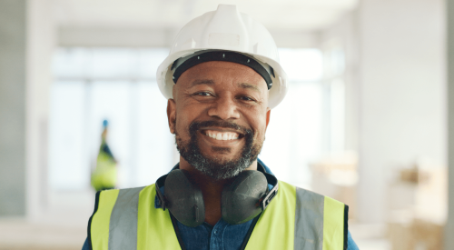 Optimistic home builder on jobsite