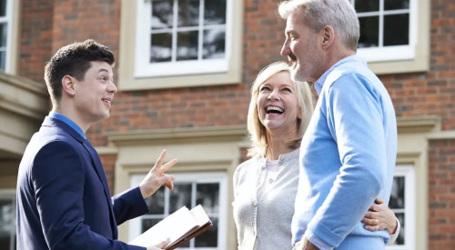 Realtor showing a home to potential homebuyers 